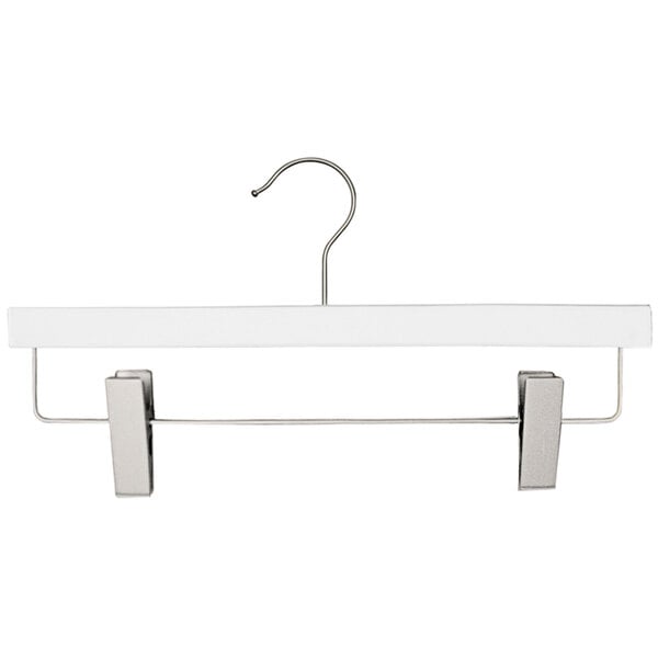 A white wooden skirt/pant hanger with metal clips.