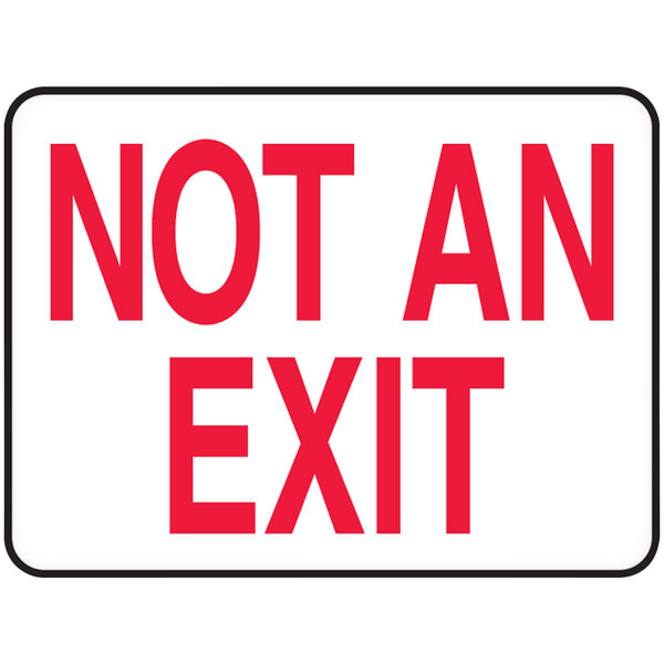 An Accuform "Not An Exit" warehouse sign with red text on a white background.