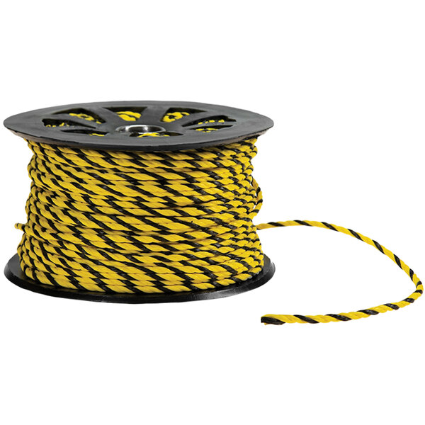 A spool of Accuform black and yellow polypropylene barricade rope.