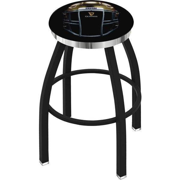A black and silver Holland Bar Stool with a round padded seat and a chrome band with a football helmet on it.