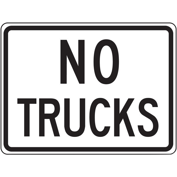 A white rectangular Accuform parking lot sign with black text that says "No Trucks"