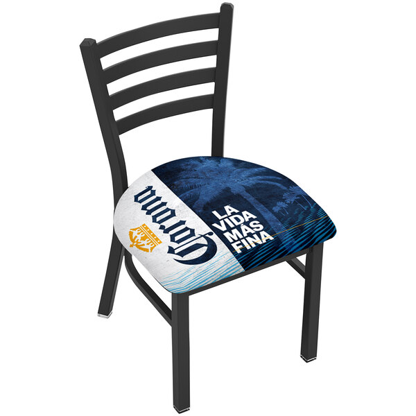 A white Holland Bar Stool stationary chair with a navy palm tree logo on the seat and back.
