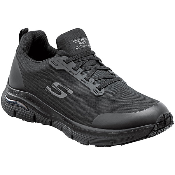 A black Skechers Work Jake men's athletic shoe with a white Sketchers logo on the side.