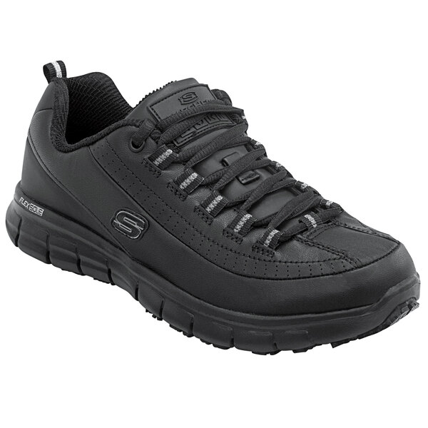 A black Skechers work shoe with laces.