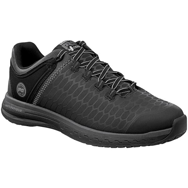 A black Timberland PRO Powerdrive athletic shoe for men with laces.