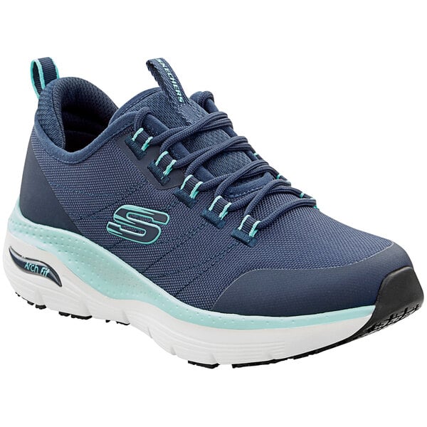 A close up of a navy and aqua Skechers Work Christina athletic shoe.