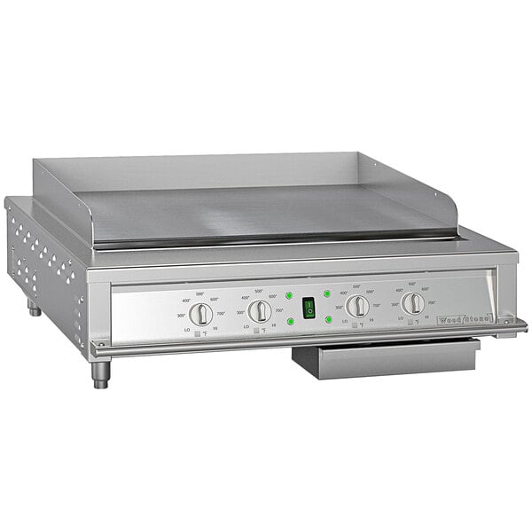 A Wood Stone stainless steel electric countertop griddle with two burners.