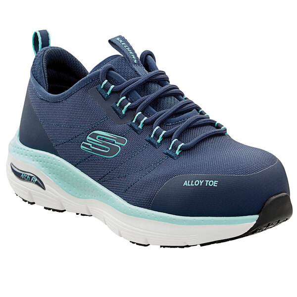 A close up of a navy blue and aqua Skechers Work Sadie athletic shoe with alloy toe.