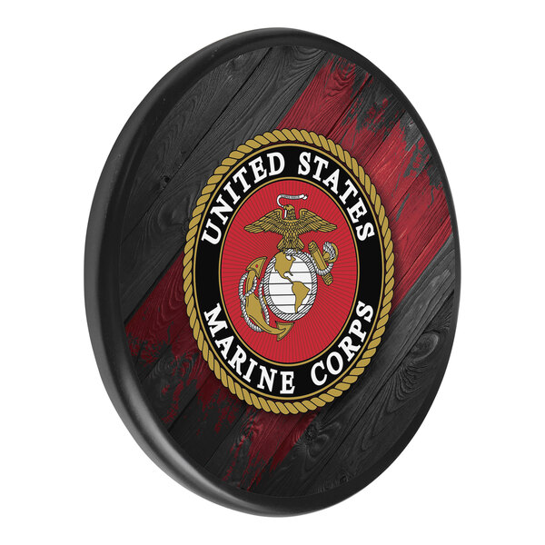 A red and black wooden sign with the United States Marine Corps emblem.