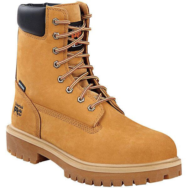 A pair of Timberland wheat brown leather work boots with laces.
