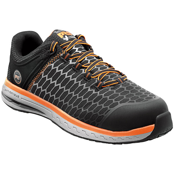 A black and orange Timberland men's athletic shoe with a composite toe.