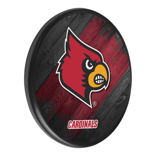 A wooden sign with the University of Louisville Cardinals logo in red, black, and white.