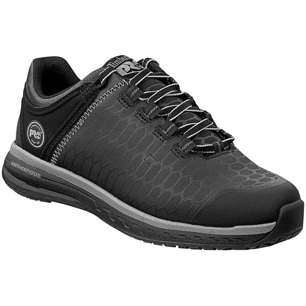 A black Timberland PRO athletic shoe for women with laces.