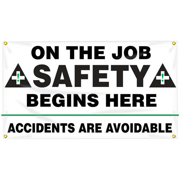 A white Accuform safety banner with black text that reads "On The Job Safety Begins Here"