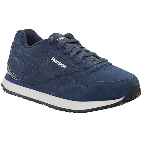 A navy Reebok Harman women's athletic shoe with white accents and sole.