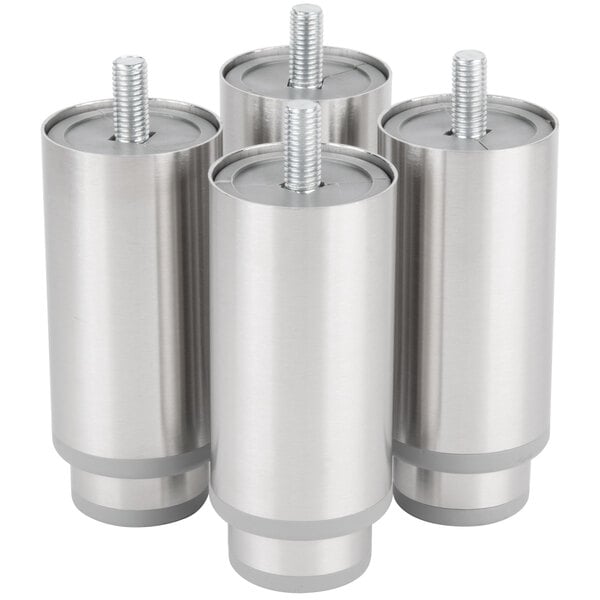Three stainless steel cylinders with screws on them, used for refrigeration equipment.