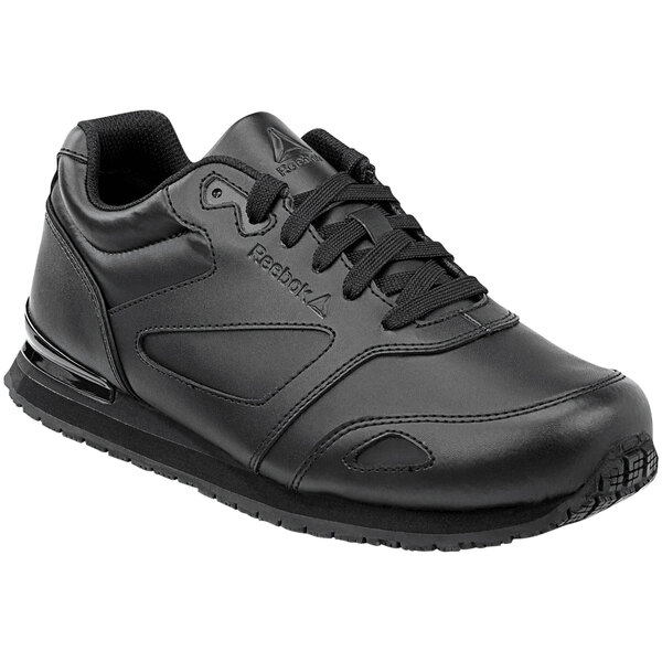 A black Reebok Work women's athletic shoe with laces.