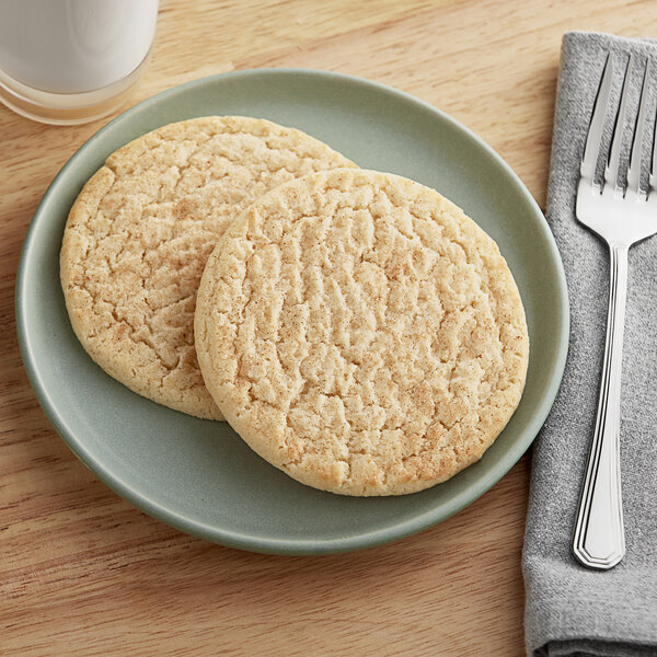 Two Best Maid Thaw and Serve Snickerdoodle cookies on a plate.