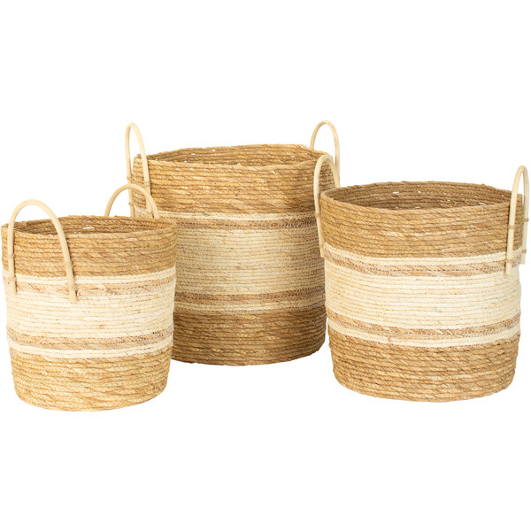 A group of three Kalalou woven display baskets with handles.