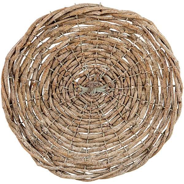 A circular woven charger plate made of gray twigs.