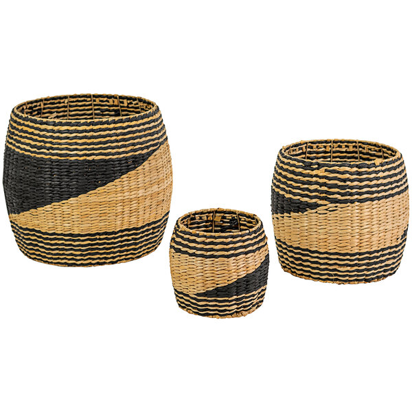 Three black woven seagrass baskets with a two-tone stripe design.