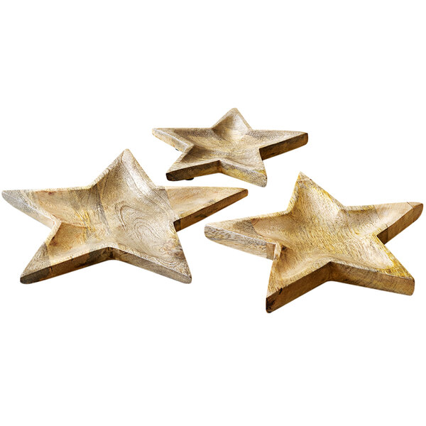 A group of wooden star shaped trays.