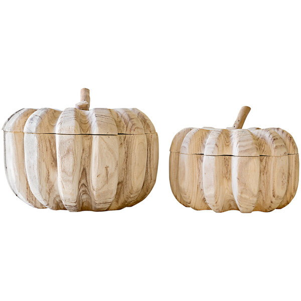 A couple of wooden pumpkin-shaped containers with lids.