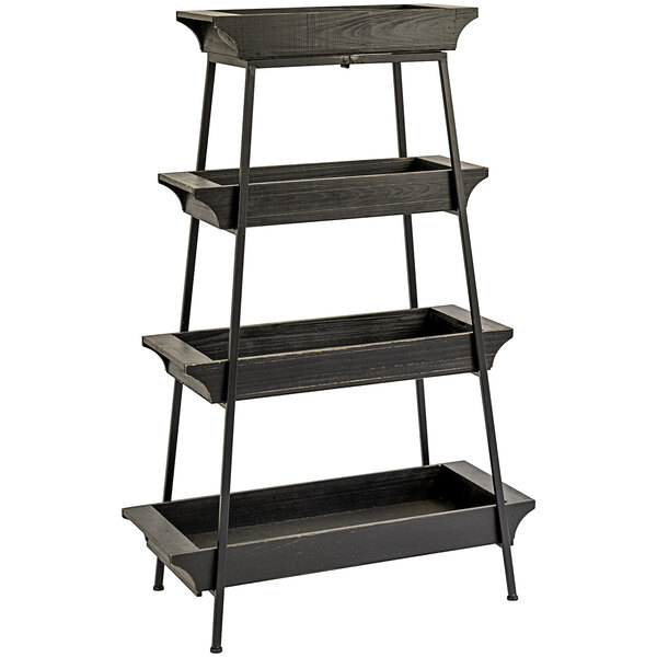 A black wooden merchandise stand with iron base and four shelves.