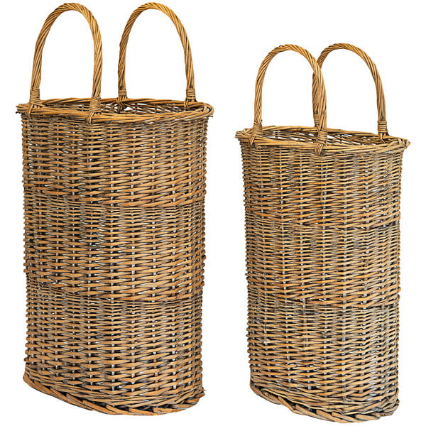 A pair of wicker oval display baskets with handles.