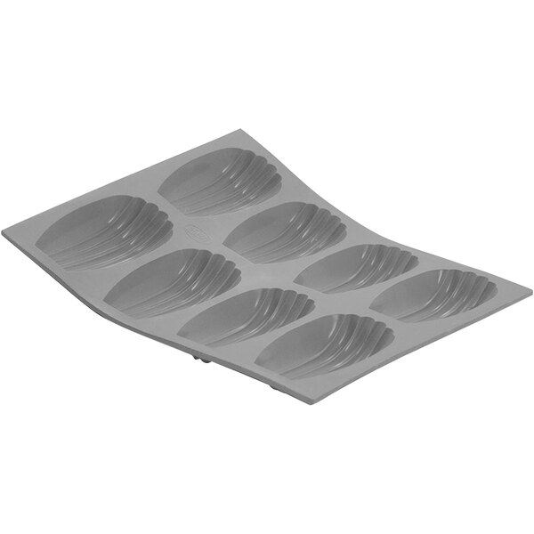 A de Buyer silicone baking mold with 8 Madeleine shapes.
