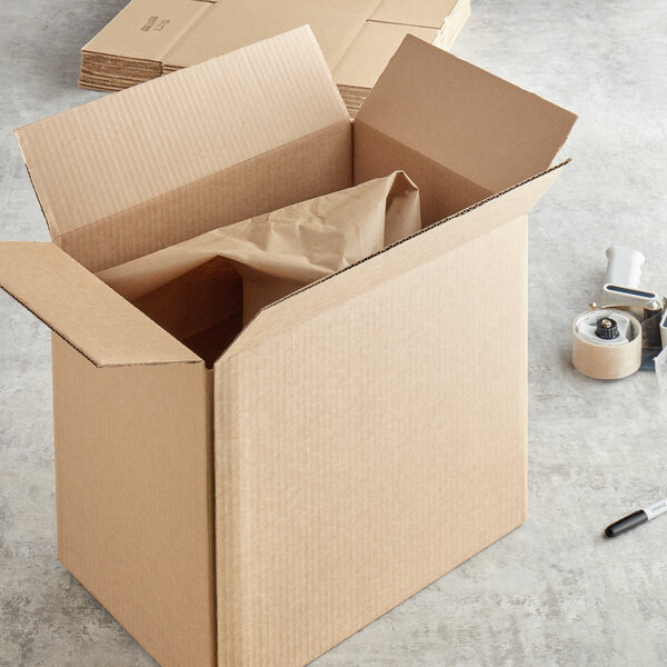 A Lavex kraft cardboard shipping box with tape on it.