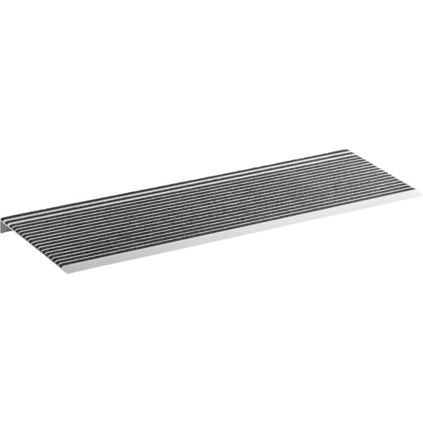 A black mat with black grit strips.