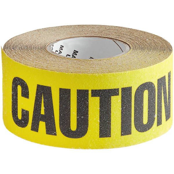 A roll of black and yellow Wooster Flex-Tred "Caution" anti-slip tape.