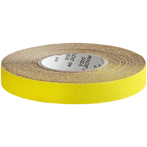 A roll of yellow Wooster Flex-Tred safety tape.