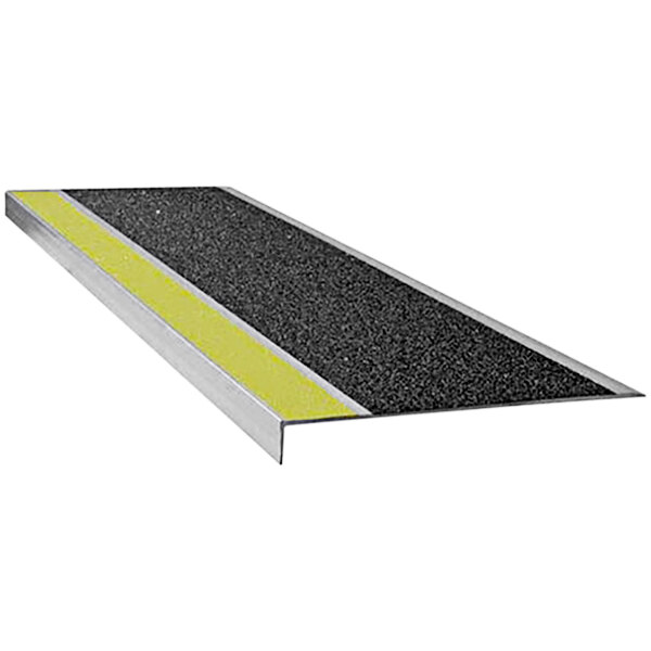 A black Wooster Flexmaster stair tread with yellow stripes and a yellow grit surface.