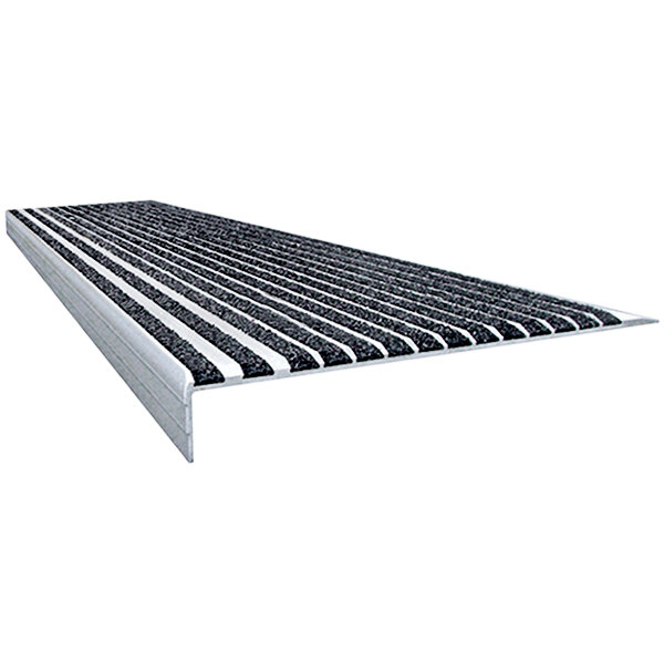 A black and white Wooster Stairmaster stair tread with black grit strips.
