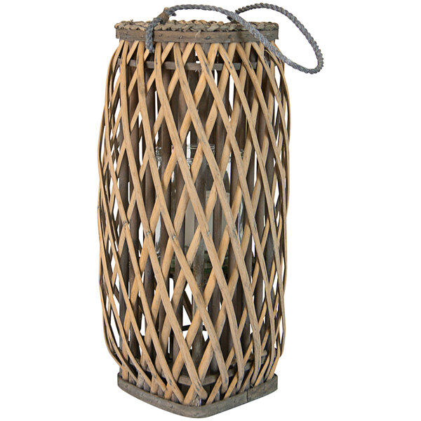 A wicker lantern with a rope handle.
