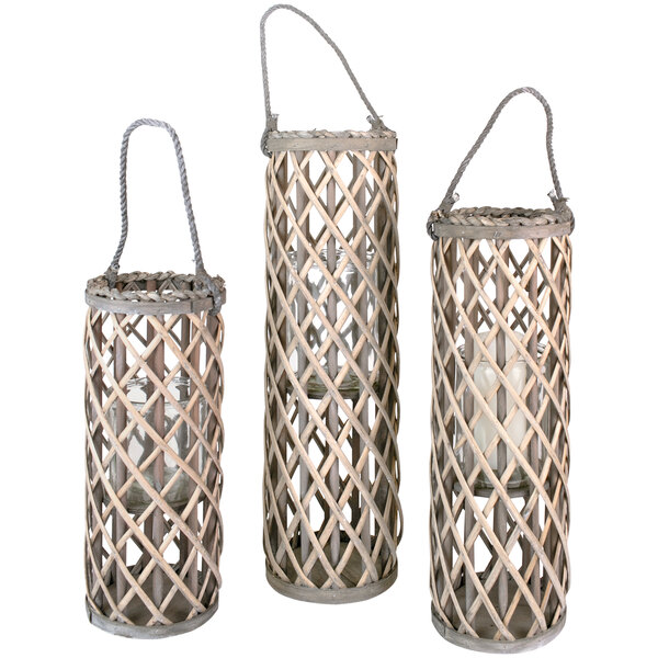 A group of three gray willow lanterns with rope handles.