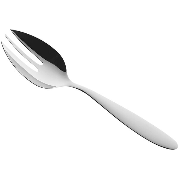 A silver serving fork with a white handle.