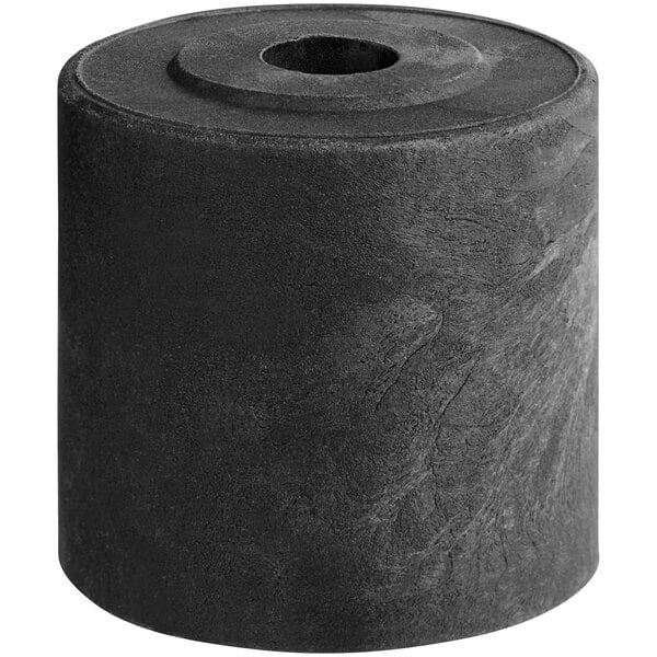 A black rubber cylinder with a hole in the middle.