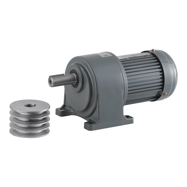 A grey electric motor with a round metal disc.