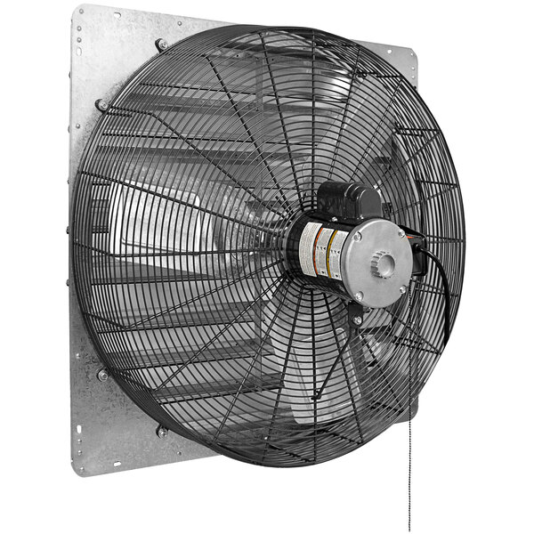 A Canarm 20" shutter-mounted fan on a wall.
