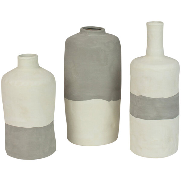 A group of Kalalou grey and white ceramic vases with stripes.
