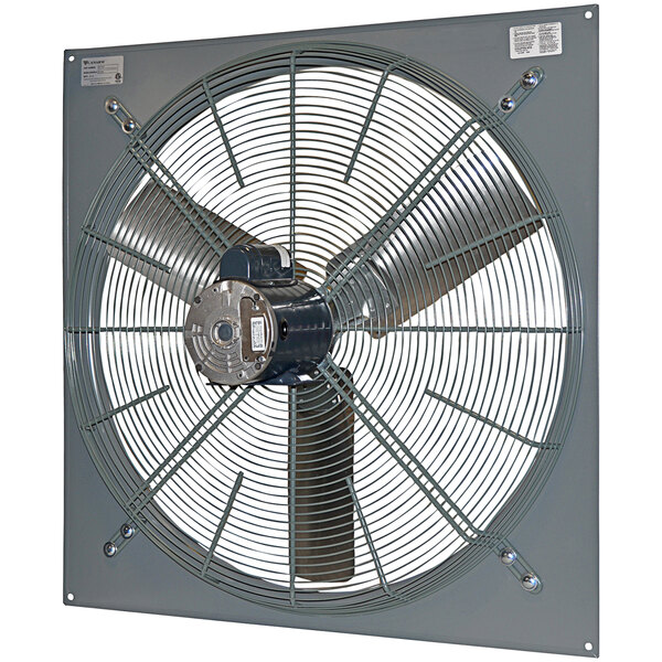 A Canarm 36" panel-mounted industrial fan with a round metal blade.