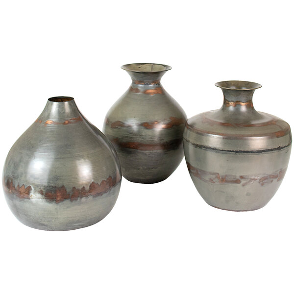 Three metal vases with copper detail.