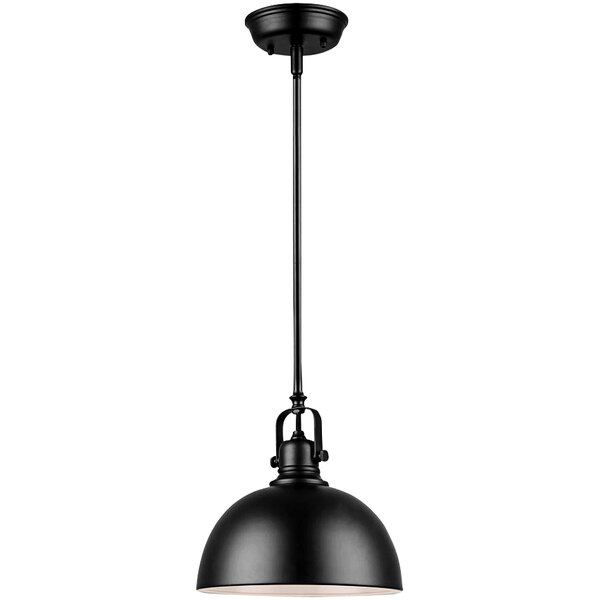 A black pendant light with a white shade over a restaurant table.