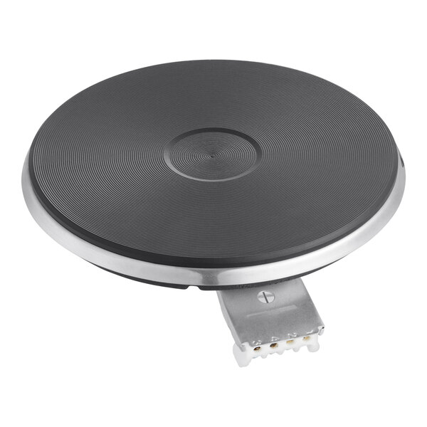 A black circular plate with a metal base and silver metal connector.