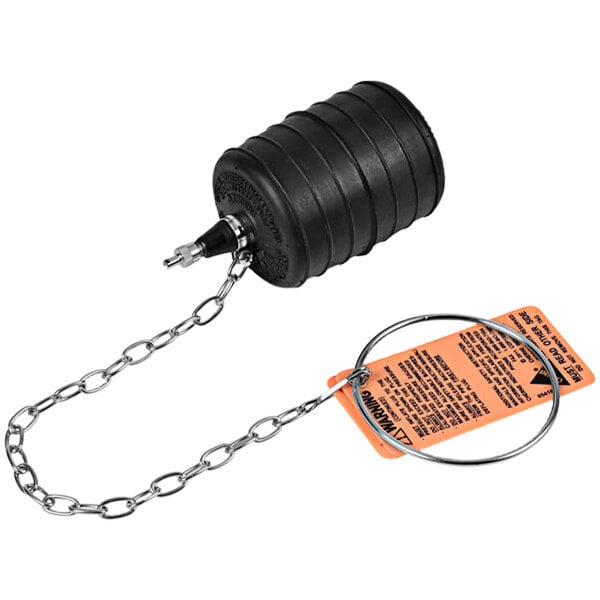 A black cylinder with a Cherne 3" Test-Ball Plug and a chain attached to it.
