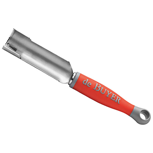 A close-up of a de Buyer manual corer with a red handle.
