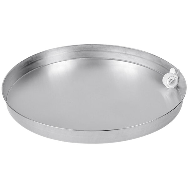 An aluminum round metal pan with a white handle.